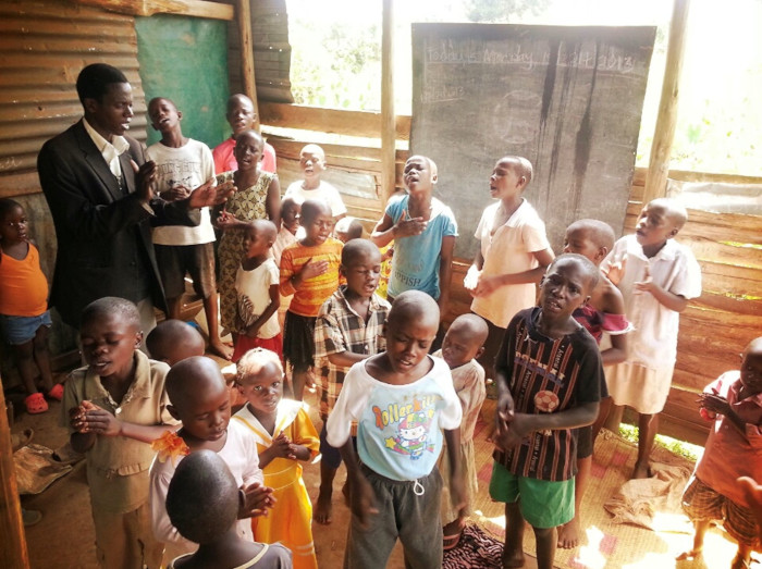 children in school praying